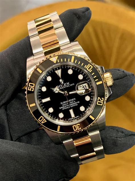 rolex submariner yellow gold watch